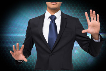 Poster - Composite image of unsmiling businessman touching