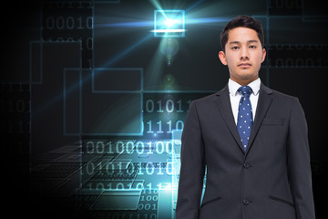 Poster - Composite image of stern businessman looking at camera