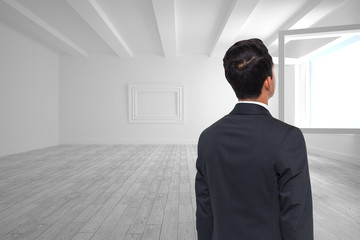 Poster - Composite image of asian businessman