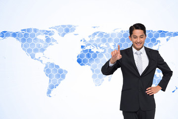 Poster - Composite image of smiling asian businessman pointing