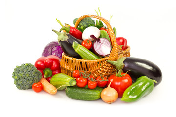 Wall Mural - Fresh, organic vegetables in the basket isolated on white