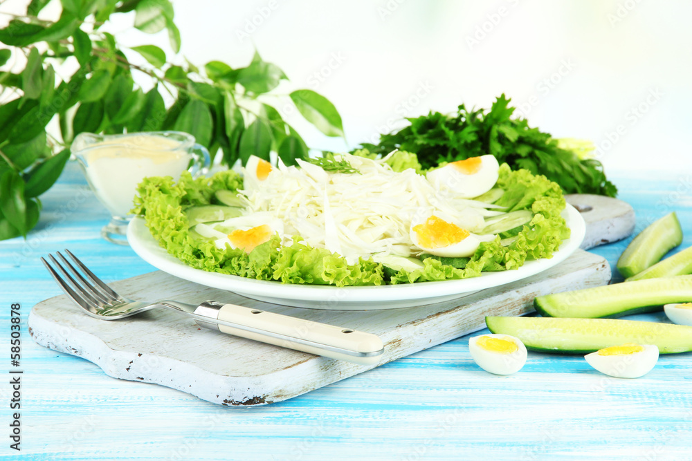 Delicious salad with eggs, cabbage and cucumbers