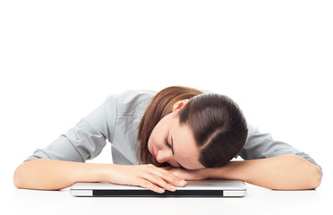 Wall Mural - Tired woman sleeping on laptop