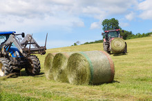 Harvesting Rolls Hay