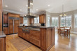 © pics721 - Kitchen with wood and granite center island