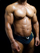 © starsstudio - Shirtless male bodybuilder in trunks, really muscular body