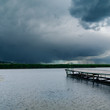 © Mykola Mazuryk - dark dramatic sky over river