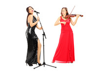 Full Length Portrait Of A Young Female Musicians