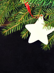 Wall Mural - Christmas fir tree on a Blackboard with copyspace for text. Chal