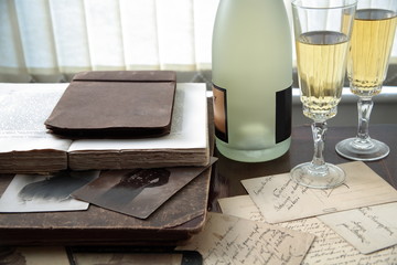 Wall Mural - Old books,letters and champagne.