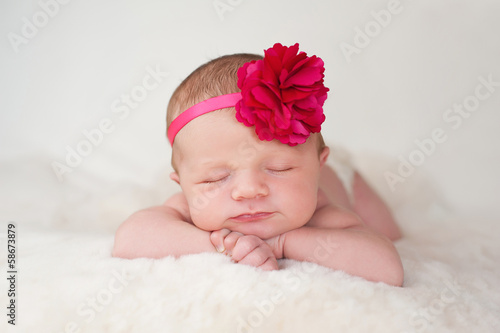 Fotografie, Obraz Newborn Baby Girl with Hot Pink Flower Headband