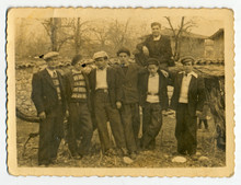 CIRCA 1940: Group Of Men And Boys On Private Land