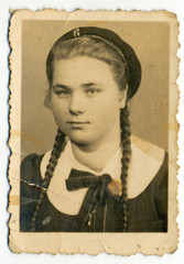 CIRCA 1945: Ordinary photo of an unknown young woman