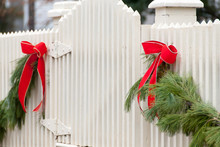 White Picket Fence, Garland, And Red Bow I