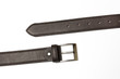 Unfastened brown leather belt