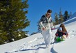 © .shock - family having fun on fresh snow at winter vacation
