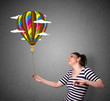 Woman holding a balloon drawing