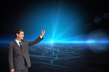Poster - Composite image of smiling businessman holding something up in t