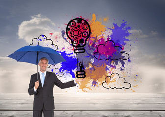Poster - Composite image of peaceful businessman holding blue umbrella
