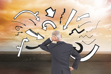 Poster - Composite image of rear view of doubtful mature businessman