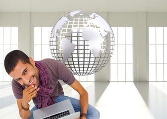 Poster - Composite image of thoughtful man sitting on floor using laptop