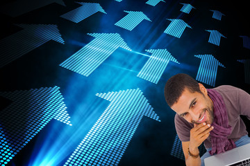 Fototapete - Composite image of thoughtful man sitting on floor using laptop