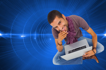 Poster - Composite image of thoughtful man sitting on floor using laptop
