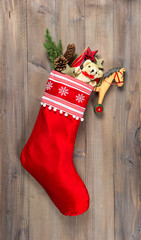 Wall Mural - christmas stocking with nostalgic vintage toys decoration