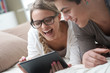 © stokkete - Happy Couple with digital tablet