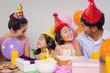 Leinwandbild Motiv Family with cake and gifts at a birthday party
