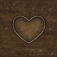 Metal Heart On A Background Of Black Leather