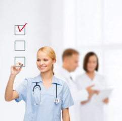 Poster - doctor or nurse drawing checkmark into checkbox