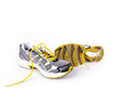 © Wouter Tolenaars - Used dirty pair of running shoes over a white background