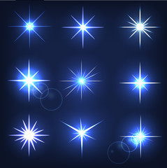 Wall Mural - set forms of sparks. shining star on a blue background