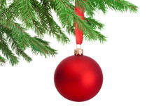 Christmas Red Ball Hanging On A Fir Tree Branch Isolated On Whit