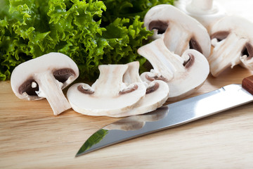 Canvas Print - Mushrooms with knife on chopping board