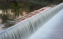 Motion Blurred River Weir