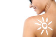 © stockyimages - Woman with sun block cream on her back