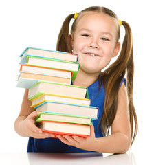 Wall Mural - Little girl with books