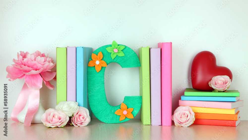 Shelf decorated with handmade knit letter