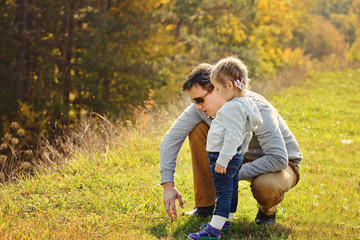 Wall Mural - father walking with toddler daughter