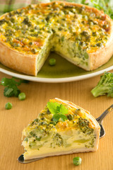 Wall Mural - Vegetable pie with broccoli, peas and cheese.