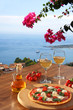 Sicily with pizza and white wine, Taormina, Italy