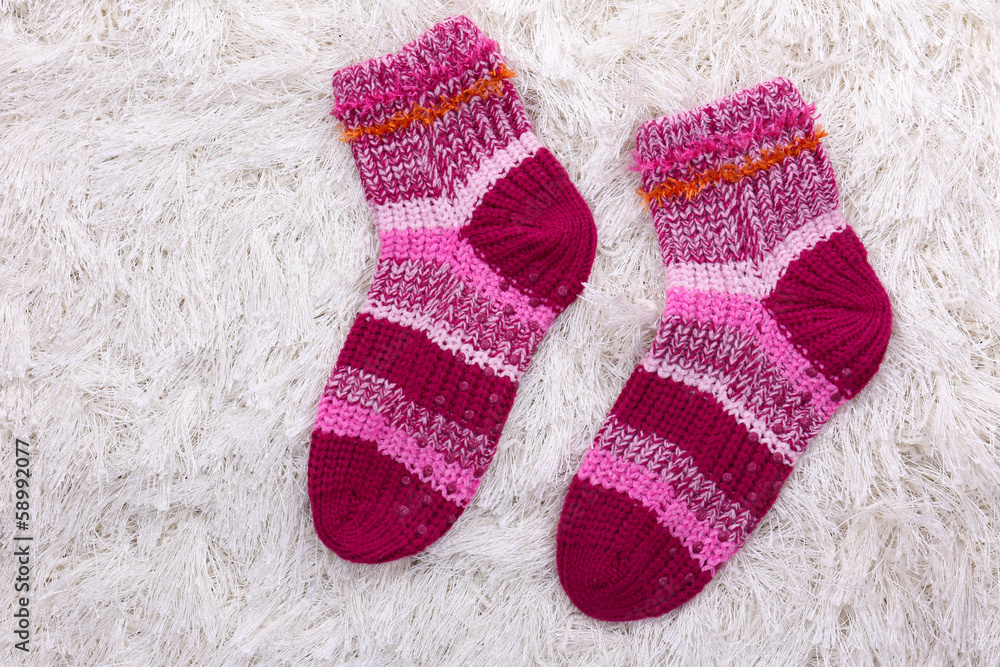 Woolen socks, on color background