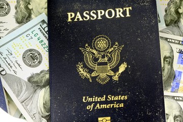 Wall Mural - United States travel passport with one hundred dollar bills