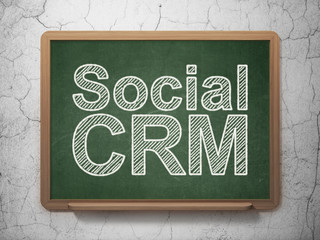 Finance concept: Social CRM on chalkboard background