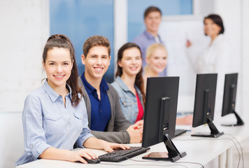 Wall Mural - students with computer monitor at school