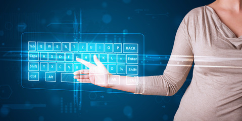 Girl pressing virtual type of keyboard