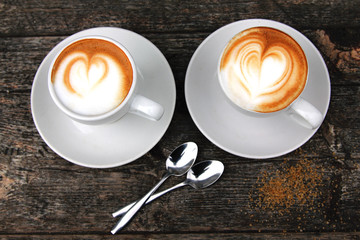 two cups of coffee cappuccino