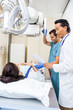 © Tyler Olson - Medical Team Preparing Patient For Xray